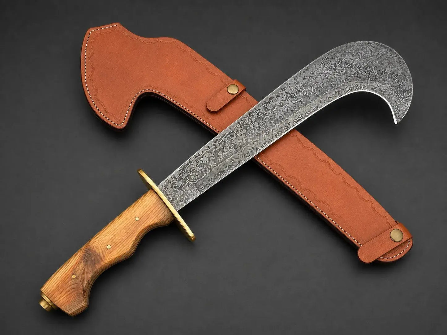 Jayger Damascus steel bill hook with curved blade, wooden handle, brass guard, and tan leather sheath.