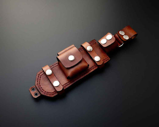 Brown leather belt with multiple pouches and buttons on a light gray background