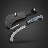 A curved fixed-blade knife with a textured black handle featuring blue inlay and silver rivets, displayed next to its black leather sheath on a dark gray background.